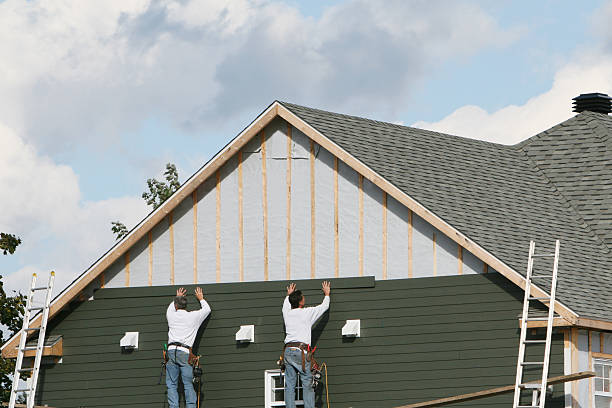 Professional Vinyl Siding technician working in North Lewisburg, OH